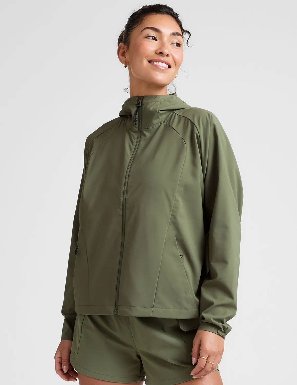 Beyond Yoga Cross Country Packable löparjacka Olive Branch