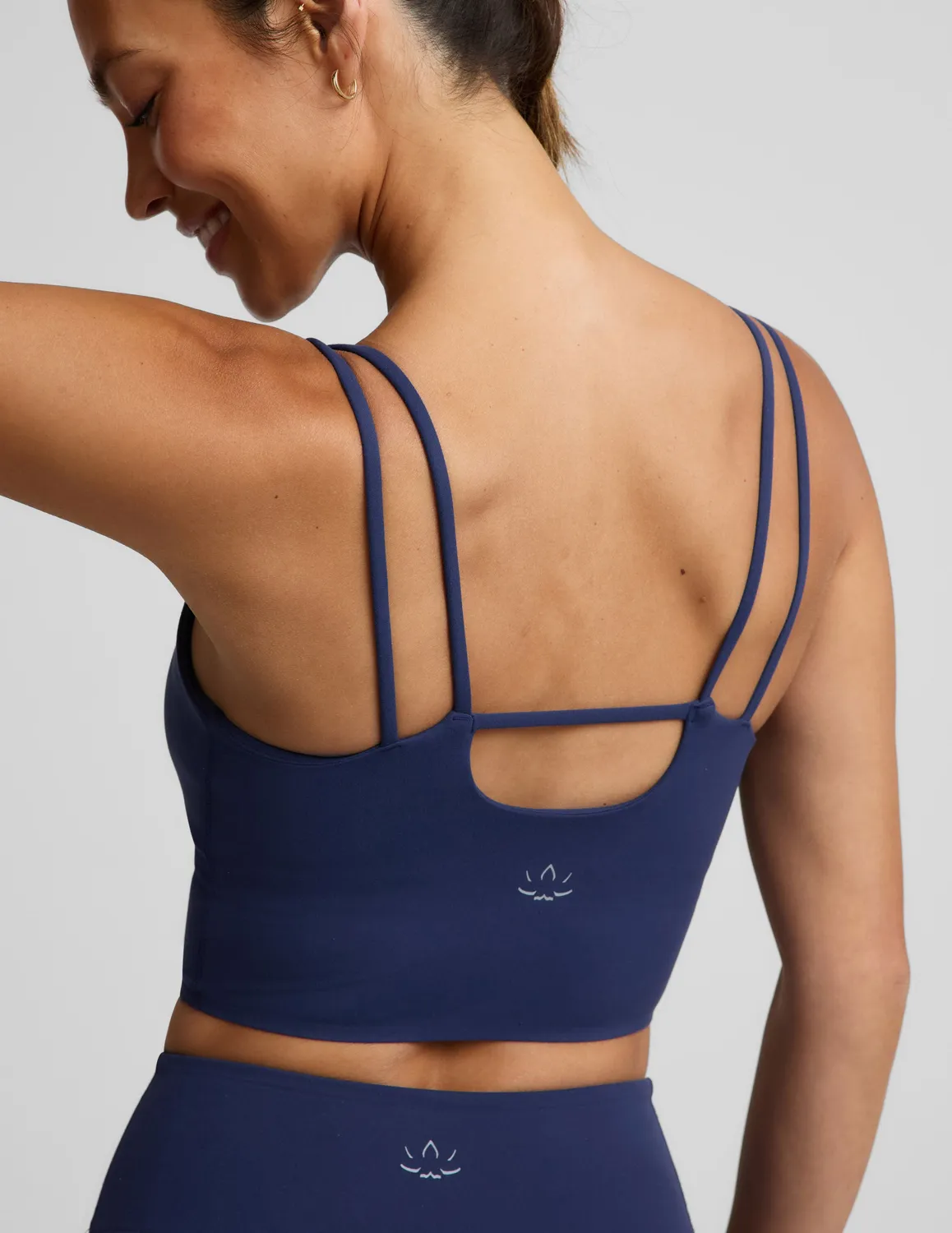 Beyond Yoga glowzone Strappy Cropped Tank träningslinne Deep Ocean