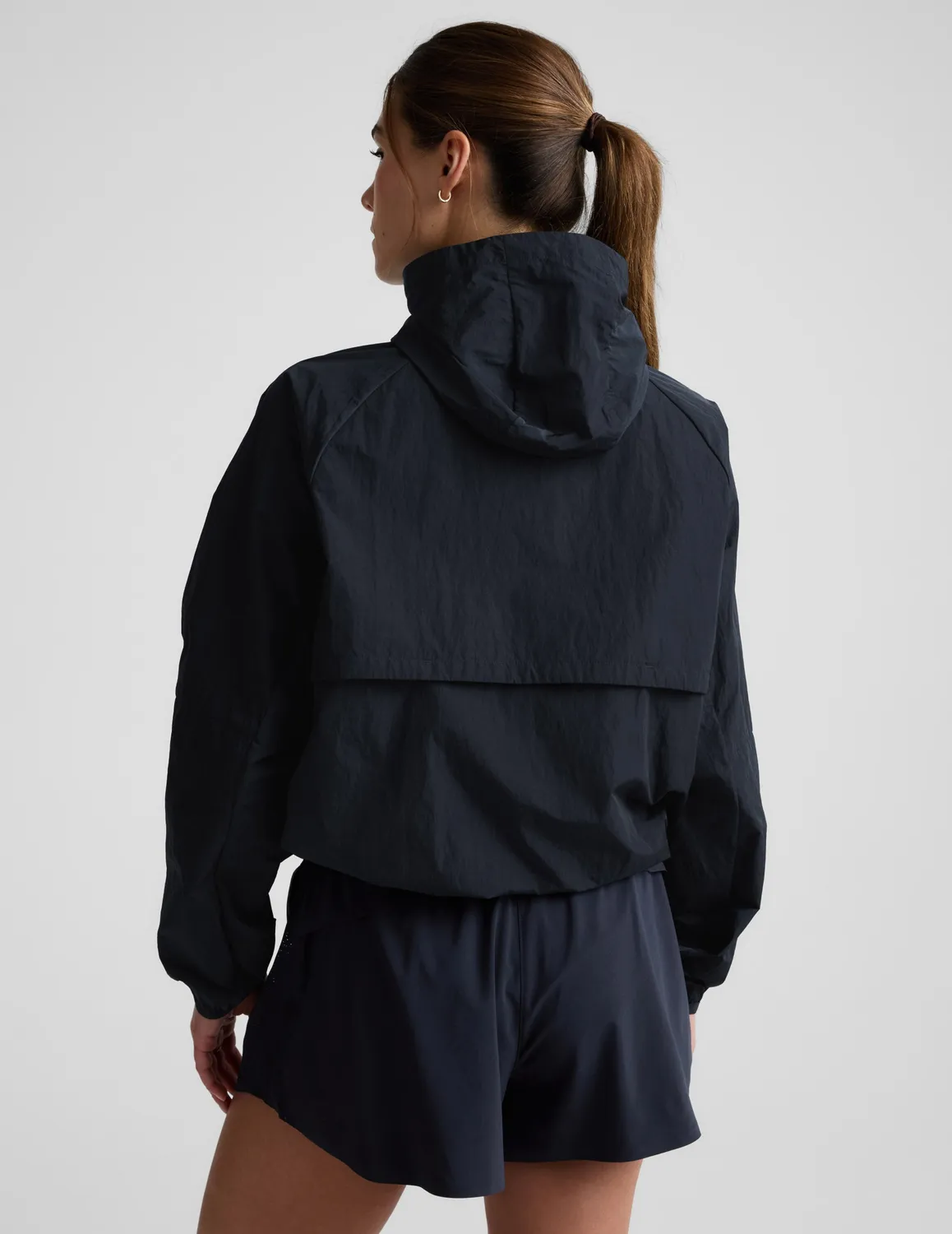 Beyond Yoga Limitless löparjacka Nocturnal Navy vattenavvisande