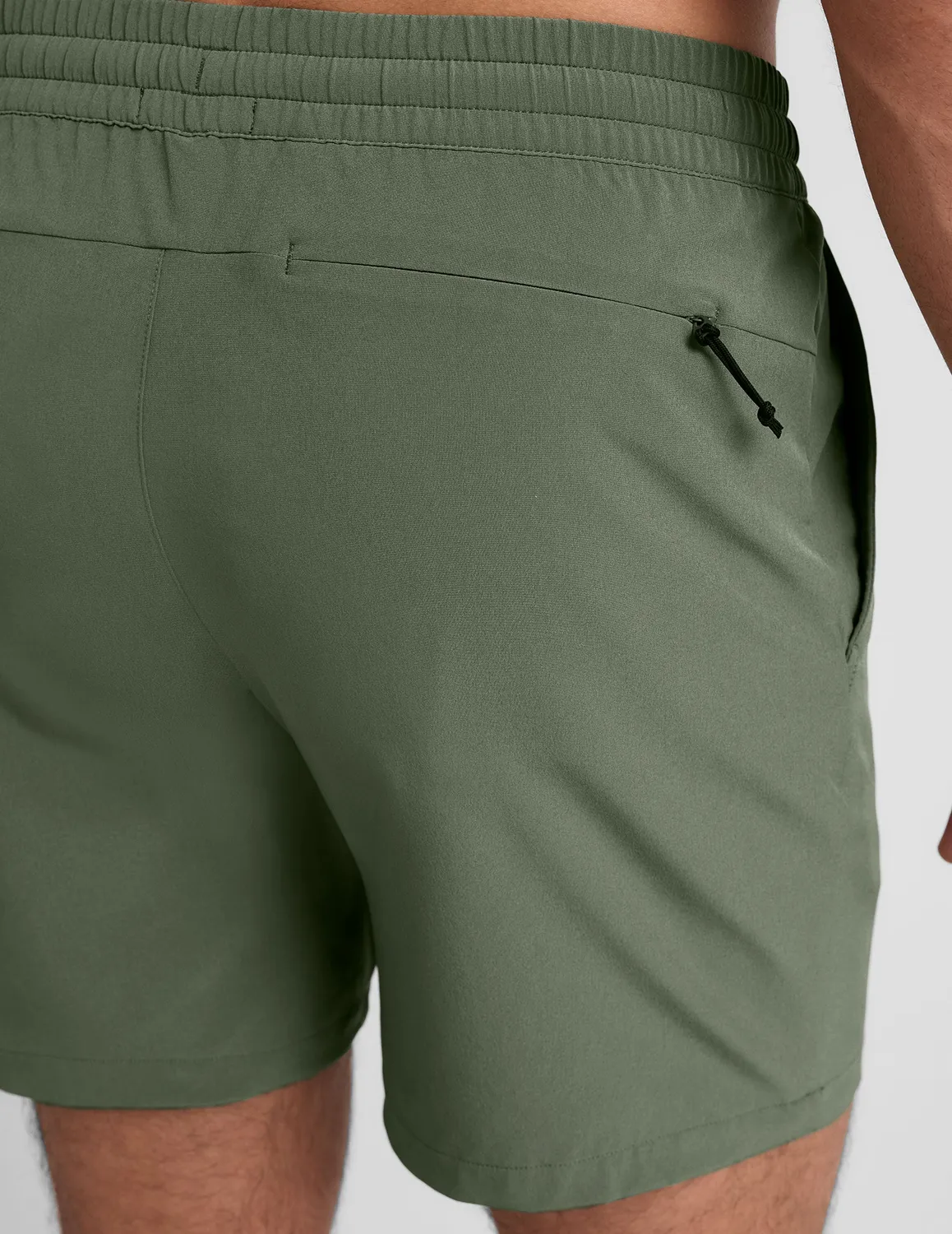 Beyond Yoga Pivotal 2.0 Men's Short 7" träningsshorts Olive Tint ofodrad