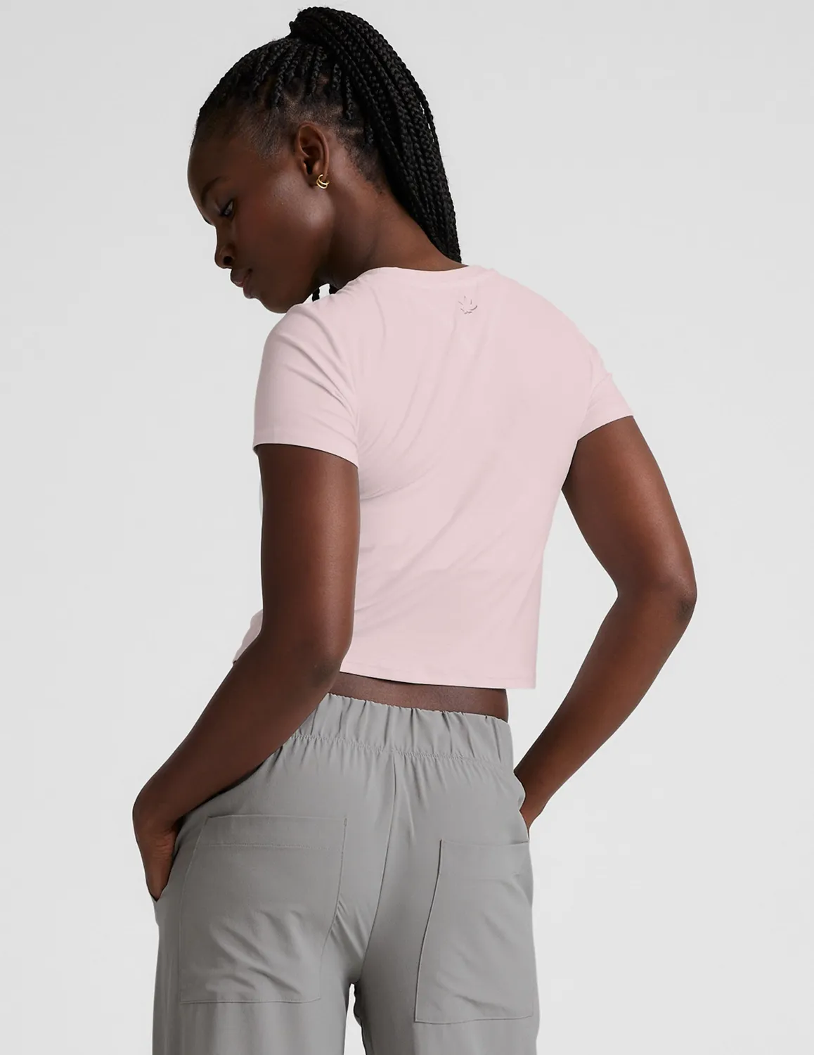 Beyond Yoga Featherweight Cropped Baby Tee Pale Pink Heather rosa